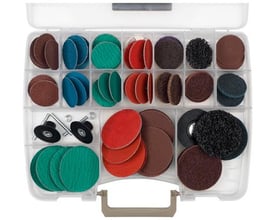 Tyrolit Qdisc 50XR_75XR demoboks P med et assortment af slibeskiver i forskellige farver, størrelser og typer, organiseret i et plastikopbevaringssystem.