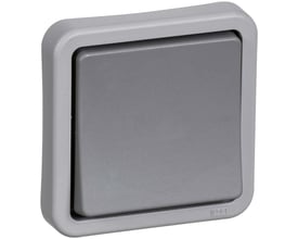 Lauritz Knudsen OPUS 74 korrespondance afbryder i mørkegrå med sløjfeklemme og IP44-klassificering, 1 modul, visende et robust design til industrielle miljøer.