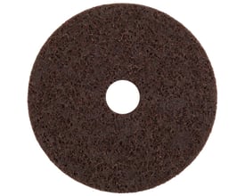 Tyrolit SCM ultrafin nylonrondel, 115 × 22 mm, set forfra med mørk slibeflade og centerhul.