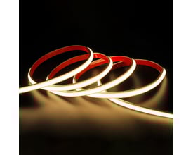 LEDlife vandtæt slim COB LED strip på 5 meter, buet, med tape på bagsiden og tændt i varmt hvidt lys.