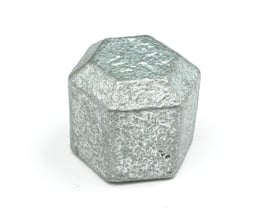 Unico galvaniseret slutmuffe 1 1/2" til rørgevind, fremstillet i blødstøbt jern med en sekskantet form for montage.