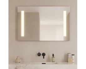 Loevschall Godhavn spejl med LED lys, 100x65 cm, monteret over en vask på et badeværelsesmøbel med tilbehør.