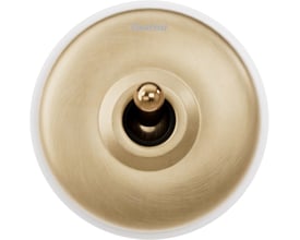 Fontini DIMBLER vip-afbryder set forfra med rund front i antik messing, hvid porcelænskant og centralt vippegreb.