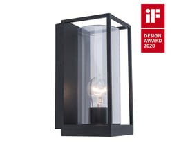 FLAIR væglampe med sort metalramme og cylinderformet glas, samt en E27 lyskilde installeret. Lampen har et IF designpris 2020 mærke.