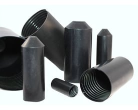 Sort krympeendemuffe sortiment til rør fra Ø15-35 mm, vist med forskellige størrelser og åben ende.