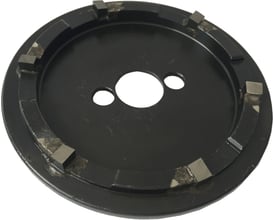 Viking kantskærer til 65 mm hulsav, viser dens runde, sorte design med udskæringer og metalindsatser på kanten.