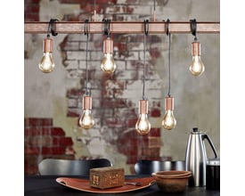 EGLO Townshend 4 langbordspendel i rustfarvet metal med seks synlige lyskilder og kobberdetaljer, monteret over et spisebord.