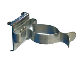 Fjederklemme med bagplade fra Maskinfabrikken Universal, Ø38mm, fremstillet af metal med præget tekst.