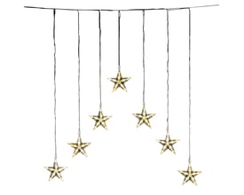 Syv isolerede Konstsmide LED stjerner hænger ned fra en sort ledning på en hvid baggrund.