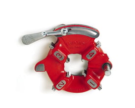 Nærbillede af Ridgid 811A skærehovedet, der viser de markerede bakker til forskellige rørstørrelser 1, 2, 3 og 4.