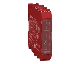 Schneider Electric Preventa XPSMCM sikkerhedscontroller i rød kapsling, set skråt forfra med frontpanel og tilslutninger.