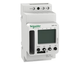 Schneider Electric IHP+ 1C digitalt kontaktur med synlige terminaler til L og N, samt en ekstern indgang og 24-timers urskive vist fra siden.