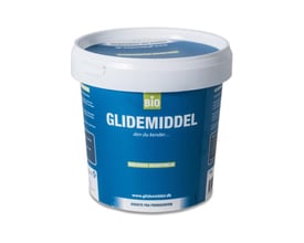 En 1 kg bøtte Glidemiddel Bio, en hvid pH-neutral pasta til montage, med blå etiket der angiver 'BIO' og 'BIOLOGISK NEDBRYDELIG'.