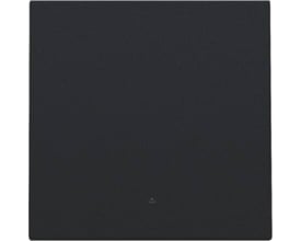 Niko smart tryk tangent i sort med integreret linse til LED indikator, monteret på en mørk baggrund.