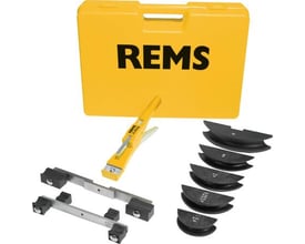 Rems Swing bukkesæt i gul opbevaringskuffert med diverse bukkeskiver og monteringsdele på hvid baggrund.