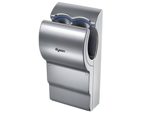 Grå Dyson Airblade dB AB14 håndtørrer med buet åbning til berøringsfri tørring af hænder.