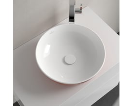 Villeroy & Boch Artis 43 cm bordstående vask i orange keramik, monteret på hvid bordplade med krom vandhane.