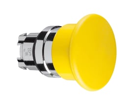 Nærbillede af Schneider Electric Harmony Style 4 gul paddetryk, Ø40 mm, viser fjeder-retur mekanismen og ZB4BC5 modelnummer på bagsiden.