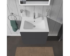 Ovenfra-perspektiv af Duravit L-Cube underskab i mørkegrå med porcelænsvask og armatur, integreret i et moderne badeværelsesmiljø.