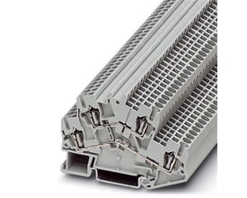 Detaljeret billede af Phoenix Contact etagefjederkraftklemme STTBS 2,5, der viser de interne fjederkontakter og ledningsføring.