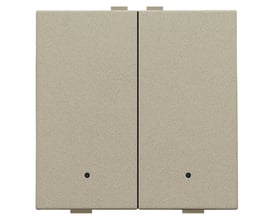 Niko 2-tryk med LED og komfortsensorer i champagnefarve med tekstureret overflade og diskrete grønne LED-lys.