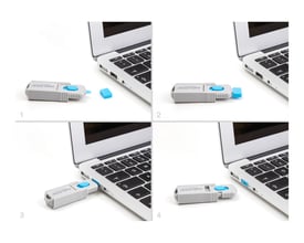 Demonstration af DeLock USB port blocker sætets funktion: Indsættelse af en blå USB blocker i en USB-port med et værktøj.