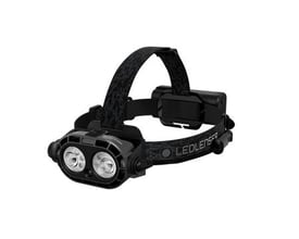 Ledlenser H21R genopladelig pandelampe med sort pandebånd, to synlige linser og batteri bag på hovedet.