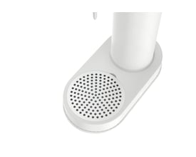 Nærbillede af den hvide Philips sodavandsmaskines bund med drypbakke og perforeret overflade.