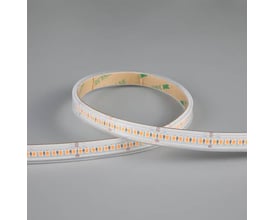 Ansell Lighting P-Cell 5 meter LED strip med synlige dioder og 3M tape på bagsiden, monteret på grå baggrund.