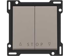 Niko tangent til jalousiafbryder i bronze finish, med symboler for op, stop og ned, monteret på sort ramme.