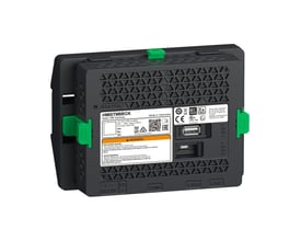 Bagside af Schneider Electric HMISTM6BOX modulær HMI skærm med mærkater, porte og DC24V/FG terminaler.