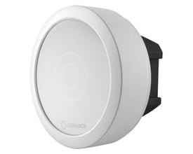 Ledvance Biolux HCL Control Unit S ZB, en Zigbee-lysestyringskomponent med rund, hvid front og sort bagside.