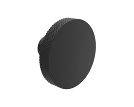Sort Svedbergs L1-knop set skråt forfra med rund, glat front og rillet, mønstret kant.