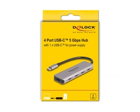 DeLock USB-hub med fire USB-C-porte vist på gul emballage, hvor hub og kabel er afbildet.