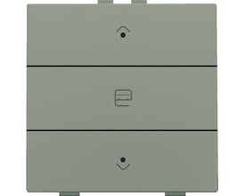 Niko motortryk i bronze med LED-indikator og symboler for op, stop og ned på en ensfarvet baggrund.