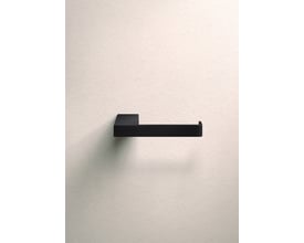 Metallbude Tuali toiletrulleholder i sort metal, vist horisontalt på en lys væg.