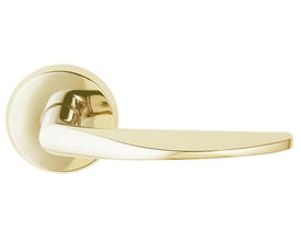 Assa Abloy dørgreb model 25/007 i poleret messing, vist fra siden med rundt rosetbeslag.