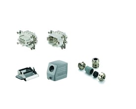 Weidmüller HE32 industristik komponenter, inklusive metal stikdele, chassismonteringsramme og kabelgennemføringer.