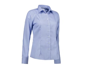 Seven Seas oxford skjorte til damer i lyseblå, størrelse XL, fremviser moderne silhuet og komfortabel pasform med diskret struktur i stoffet.