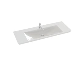 Dansani Marbelique vask i hvid keramik med et enkelt kromvandhane monteret i det forborede hanehul. Vasken er 126 cm bred og 47 cm dyb.