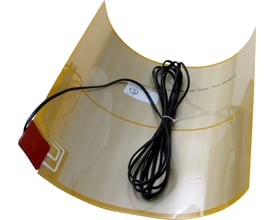 Heatcom spejlvarme 36W, 400x450 mm, vist med den gule varmefolie og tilslutningskabel.