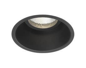 Detalje af Astro Minima Round Fixed downlight i sort, der viser den præcise kantfinish og den indre reflektors tekstur.
