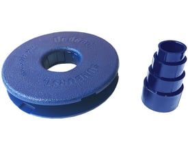 Blå Tyrolit-flange til radialbørste, 152 x 25,4 mm, med centerhul og trinvist adapterstykke.