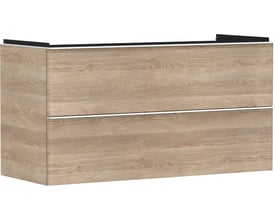 Fronten af Hansgrohe Xelu Q vaskeskab i naturlig eg-look med to grebsløse skuffer, der viser det elegante design og træstruktur.