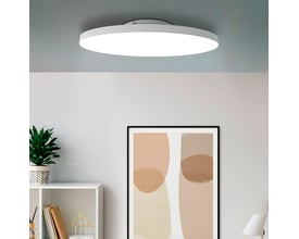 EGLO Turcona-Z Panel plafond monteret i et moderne hvidt rum med en bogreol og et billede på væggen.