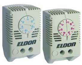 Sammenligning af to Eldon termostater ETR202 NC i lysegrå plast, med synlige justeringsskiver til temperaturindstilling i Celsius og Fahrenheit.