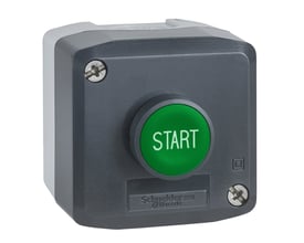 Schneider Electric trykknapbox i grå og sort med en grøn "START" trykknap og tydelig branding, monteret på hvid baggrund.