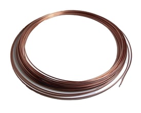 Refco TC-64 kapillarrør på 30 meter, oprullet i en løs ring, med dimensionerne Ø1,6/2,8 mm.