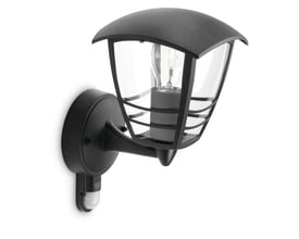 Mygarden Creek væglampe i sort aluminium med integreret PIR sensor og klart glas, viser E27 fatning og hvid baggrund.