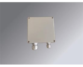 LS Control ES1064 strømforsyning 24V/60W, en kompakt lysegrå enhed med to hvide kabelklemmer i bunden.